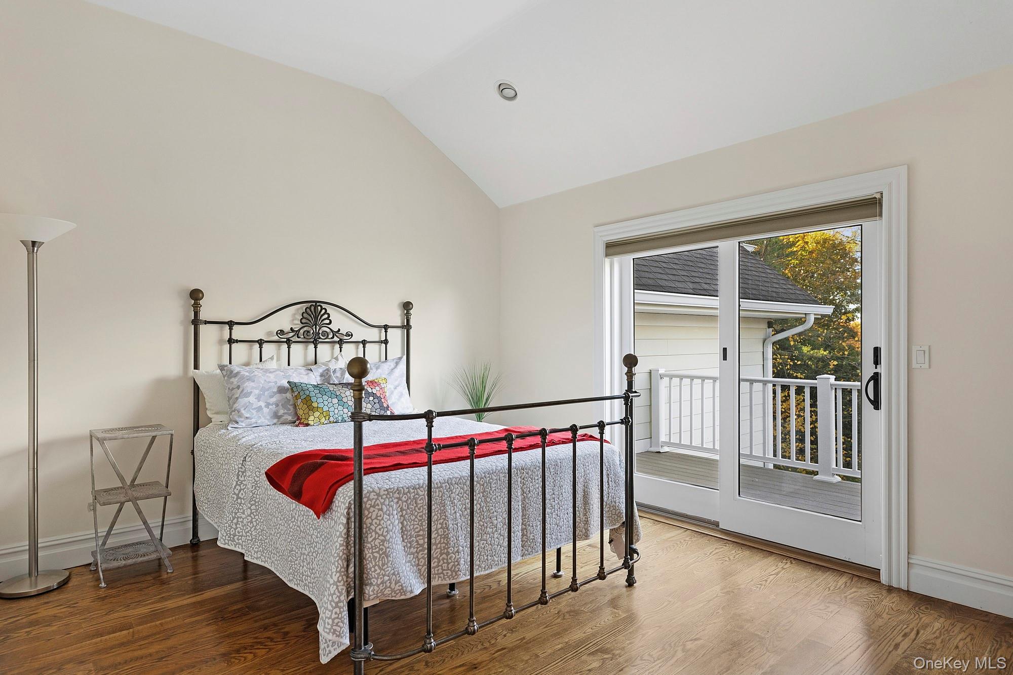 144 Round Swamp Road Huntington, NY 11743 - Photo 32 of 39 a bedroom with a bed and a window