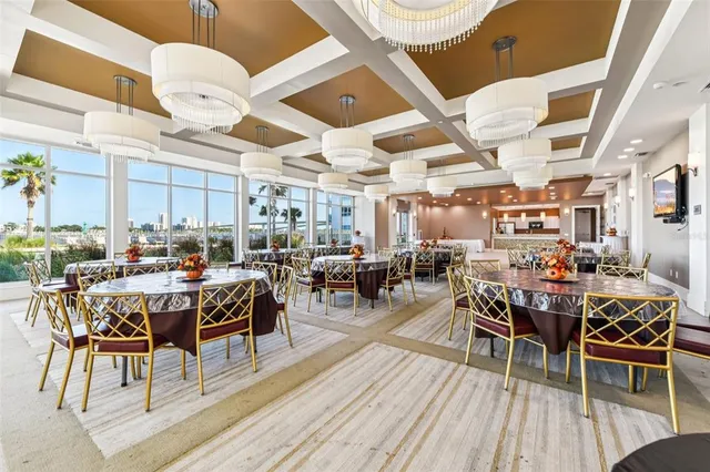 a view of a dining room with furniture window and outside view