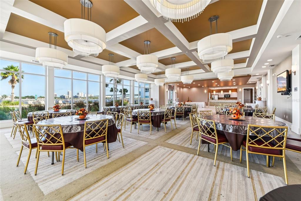 241 Riverside Drive, Unit 305 Daytona Beach, FL 32117 - Photo 28 of 35 a room with lots of wooden furniture