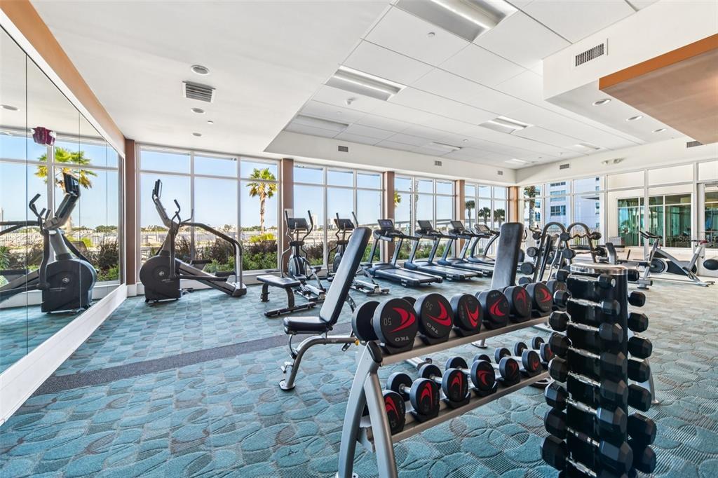 241 Riverside Drive, Unit 305 Daytona Beach, FL 32117 - Photo 32 of 35 a view of a room with gym equipment