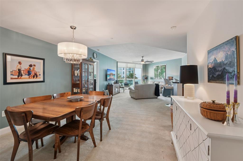 241 Riverside Drive, Unit 305 Daytona Beach, FL 32117 - Photo 10 of 35 a view of a dining room with furniture