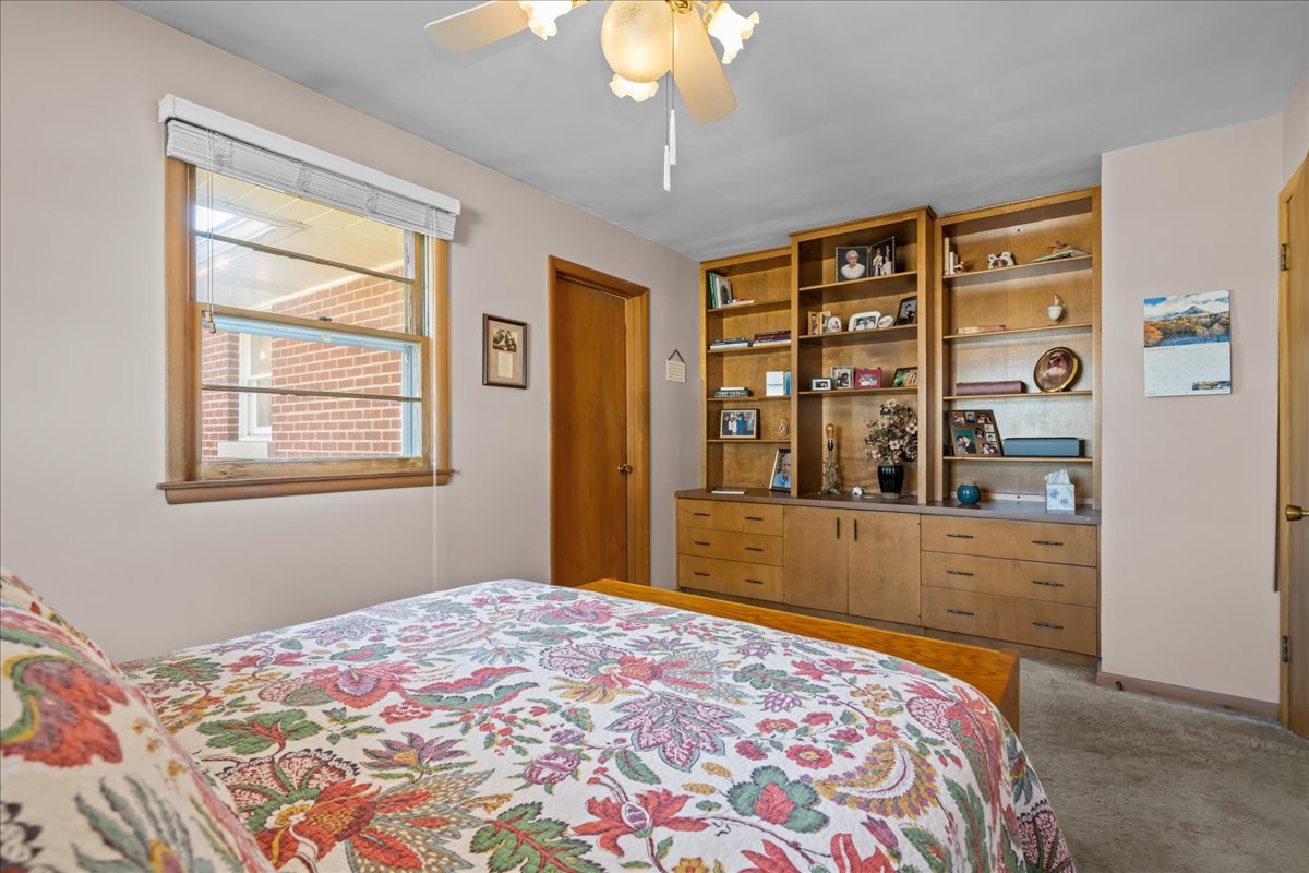 328 West State Street North Aurora, IL 60542 - Photo 21 of 31 a bedroom with a bed and a window