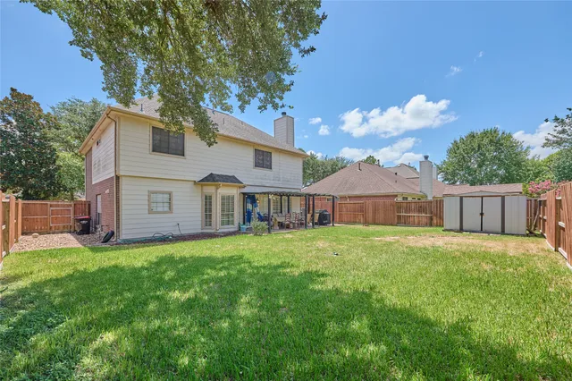 a house view with a garden space