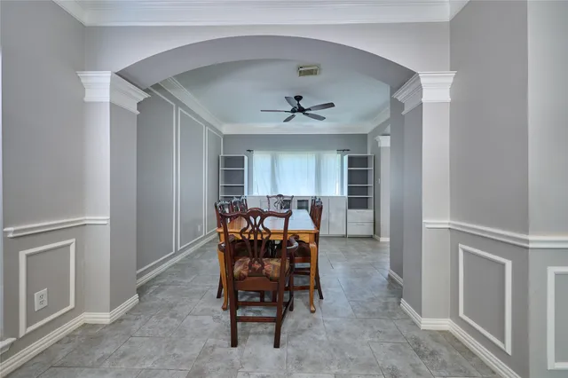 a view of a livingroom with furniture and a window
