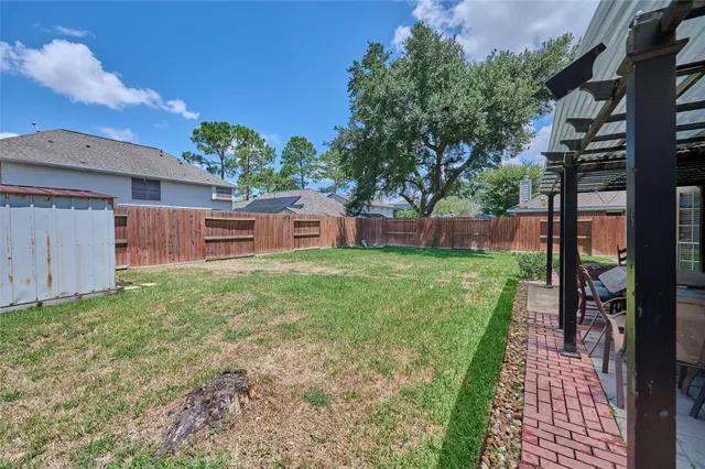 a backyard of a house with seating space