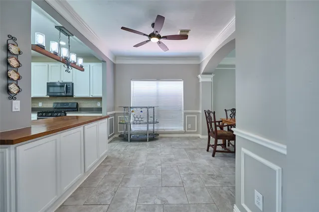a open kitchen with stainless steel appliances granite countertop a sink and cabinets
