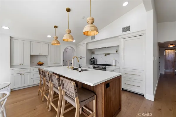 a view of a house with a yard and garage