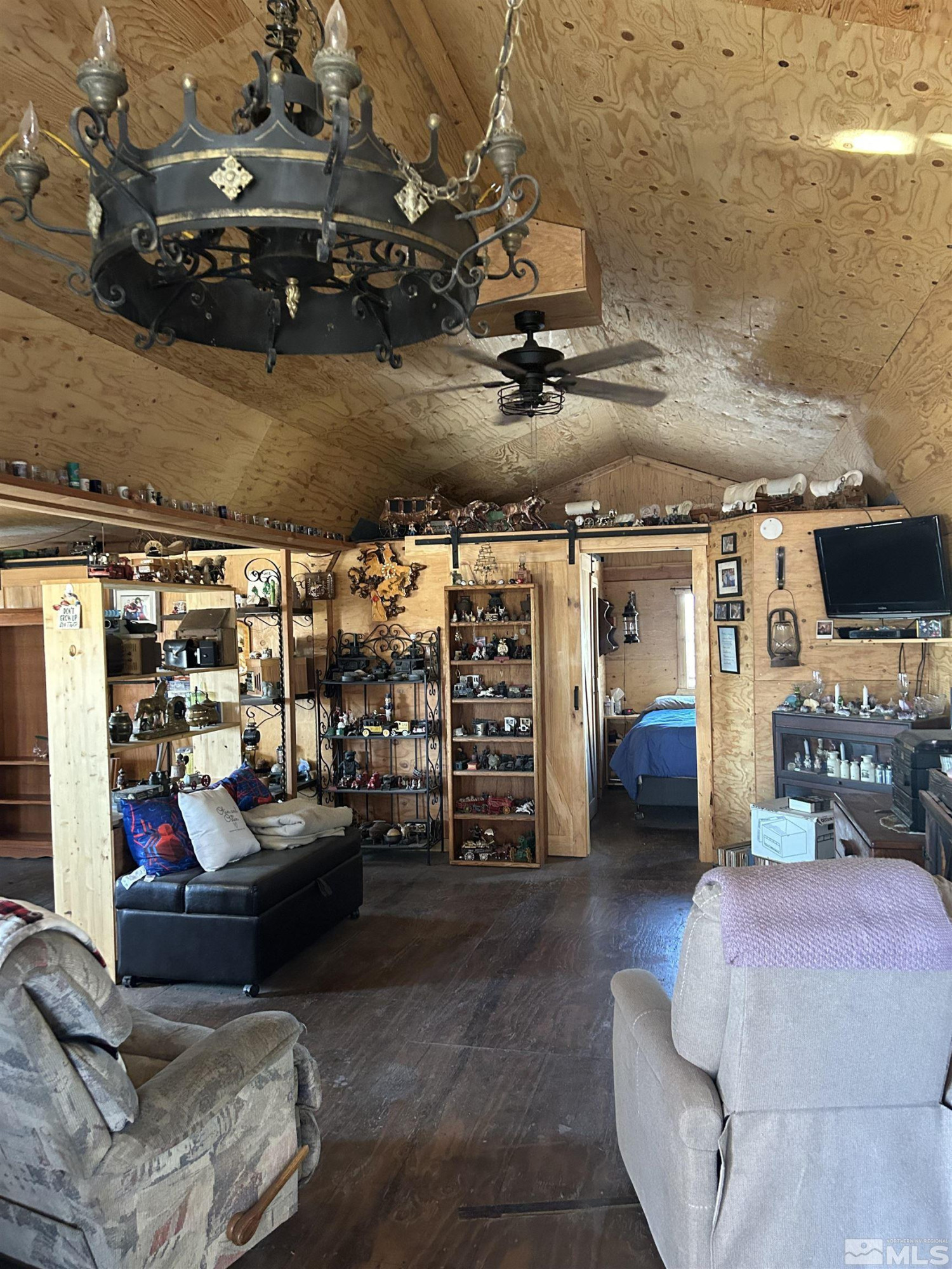 13200 Carson Highway Fallon, NV 89406 - Photo 13 of 35 a living room with lots of furniture and clutter