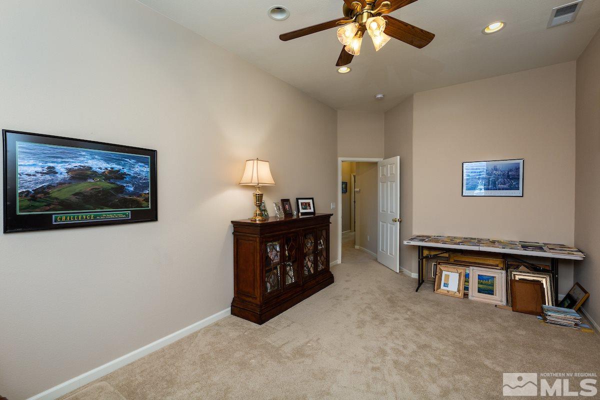10600 Sterling Ridge Way Reno, NV 89521 - Photo 15 of 25 a view of a livingroom with furniture and a ceiling fan
