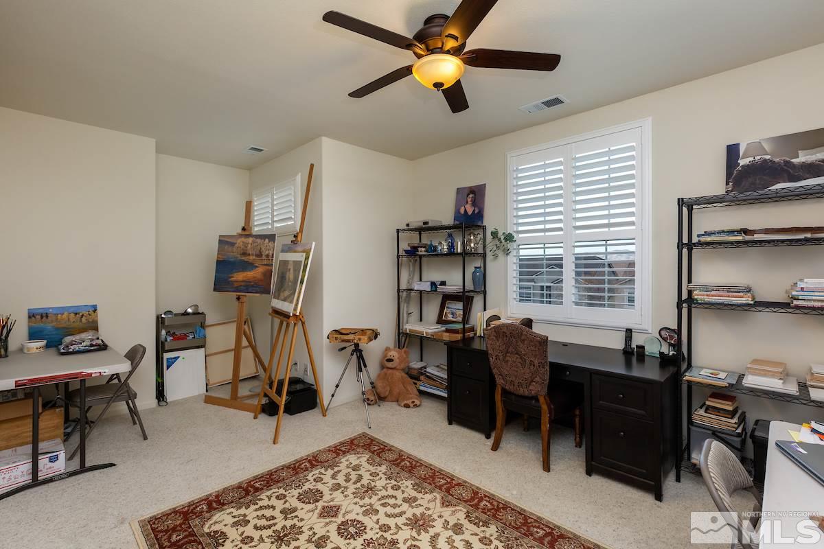 10600 Sterling Ridge Way Reno, NV 89521 - Photo 16 of 25 a view of a workspace with furniture and a window
