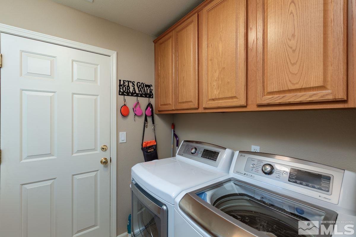 10600 Sterling Ridge Way Reno, NV 89521 - Photo 21 of 25 a utility room with dryer and washer