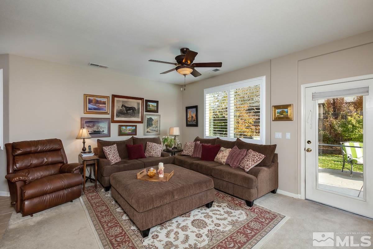 10600 Sterling Ridge Way Reno, NV 89521 - Photo 9 of 25 a living room with furniture and a large window