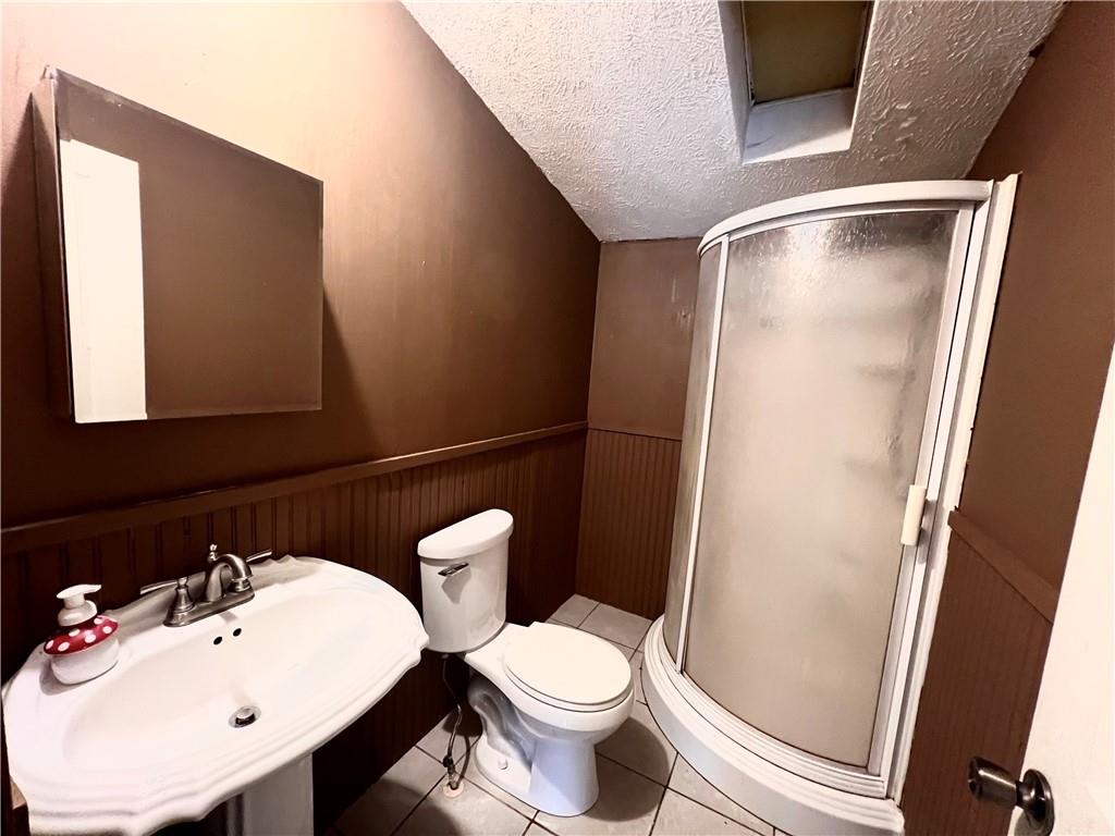151 Crum Road Bessemer, PA 16112 - Photo 13 of 16 a bathroom with a sink mirror and toilet