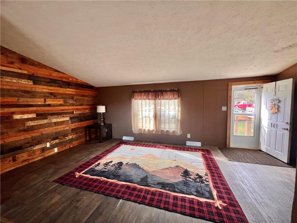 151 Crum Road Bessemer, PA 16112 - Photo 3 of 16 a bed sitting in a bedroom next to a window