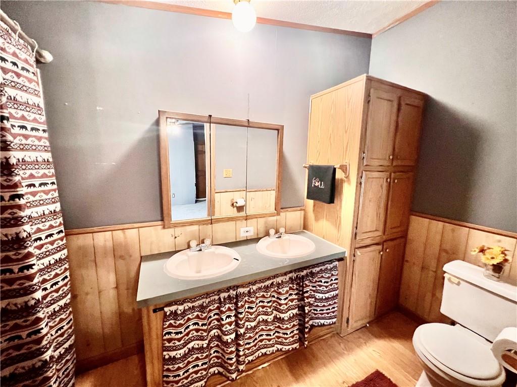151 Crum Road Bessemer, PA 16112 - Photo 6 of 16 a bathroom with a sink toilet and shower