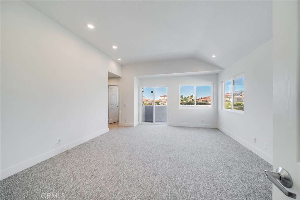 25 St John Dana Point, CA 92629 - Photo 10 of 17 a view of a big room with wooden cabinet and windows