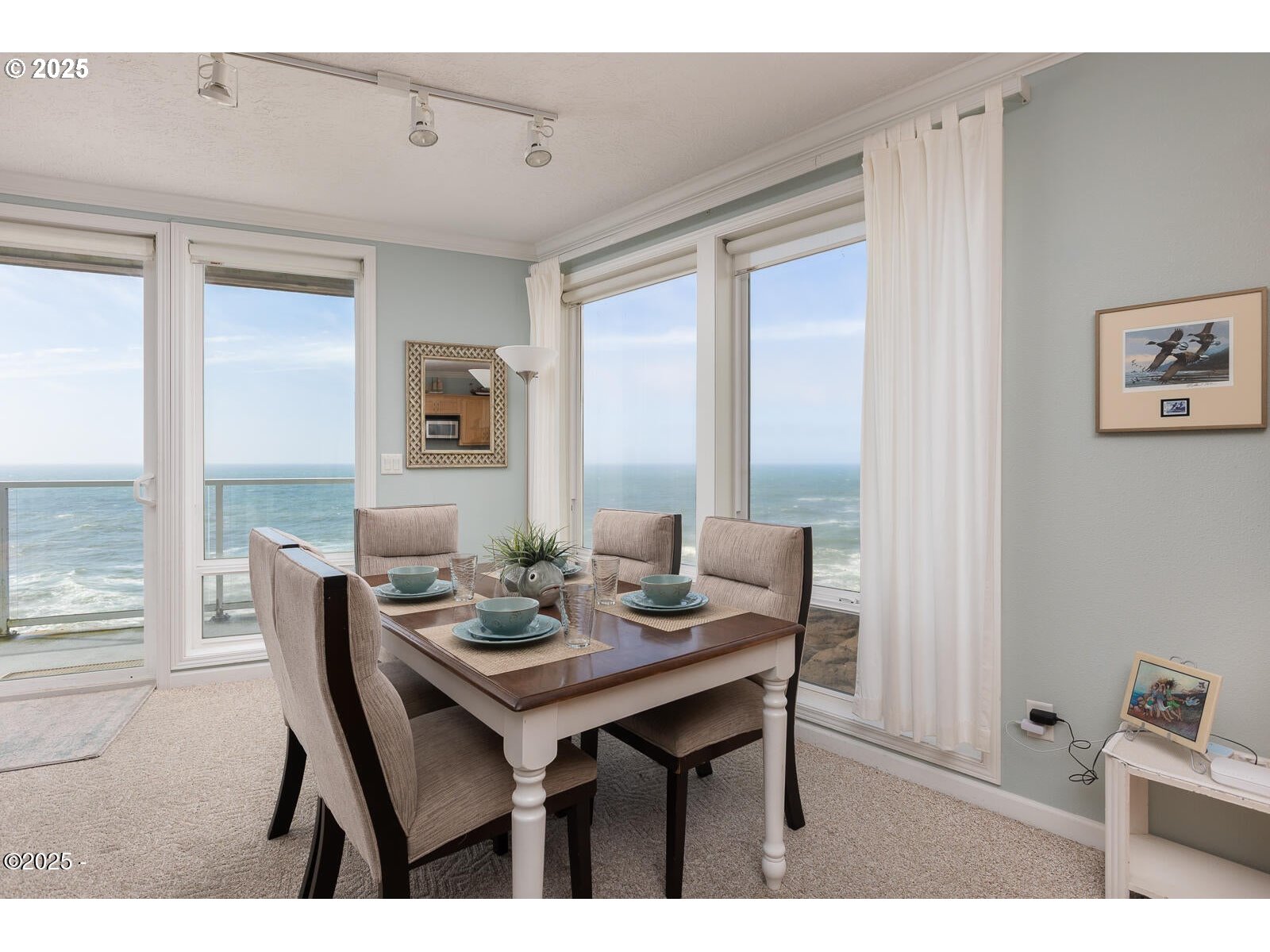 1113 Highway 101, Unit 48 Depoe Bay, OR 97341 - Photo 13 of 40 a view of a dining room with furniture and wooden floor