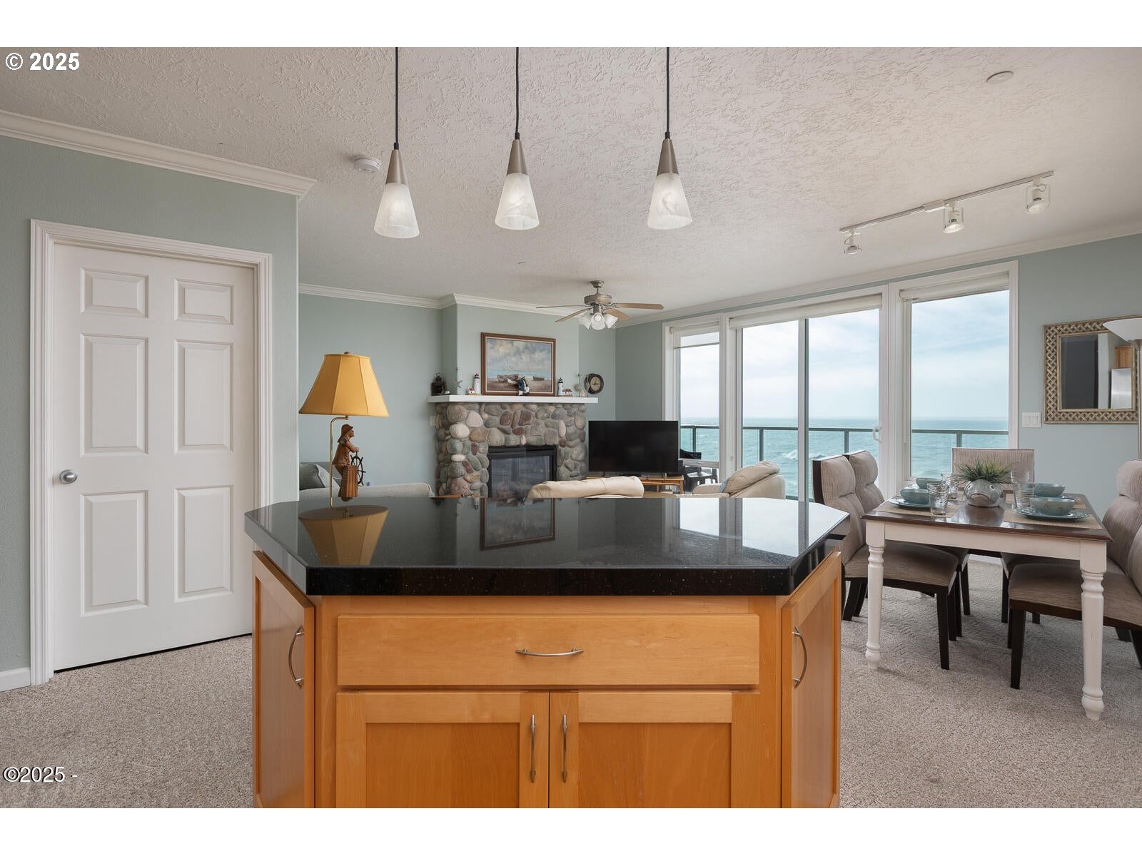 1113 Highway 101, Unit 48 Depoe Bay, OR 97341 - Photo 18 of 40 a kitchen with a dining table and chairs