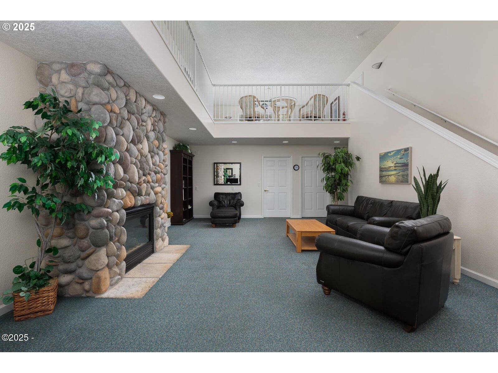 1113 Highway 101, Unit 48 Depoe Bay, OR 97341 - Photo 32 of 40 a living room with furniture and a fireplace