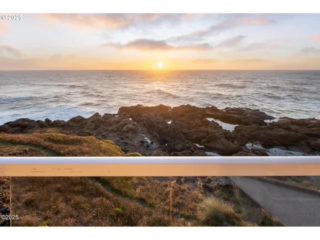 a view of ocean and mountain