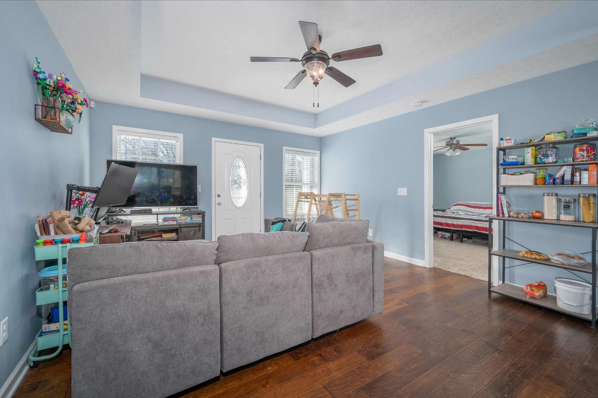 2995 Oak Grove Church Road Bethpage, TN 37022 - Photo 2 of 28 a living room with furniture and a flat screen tv