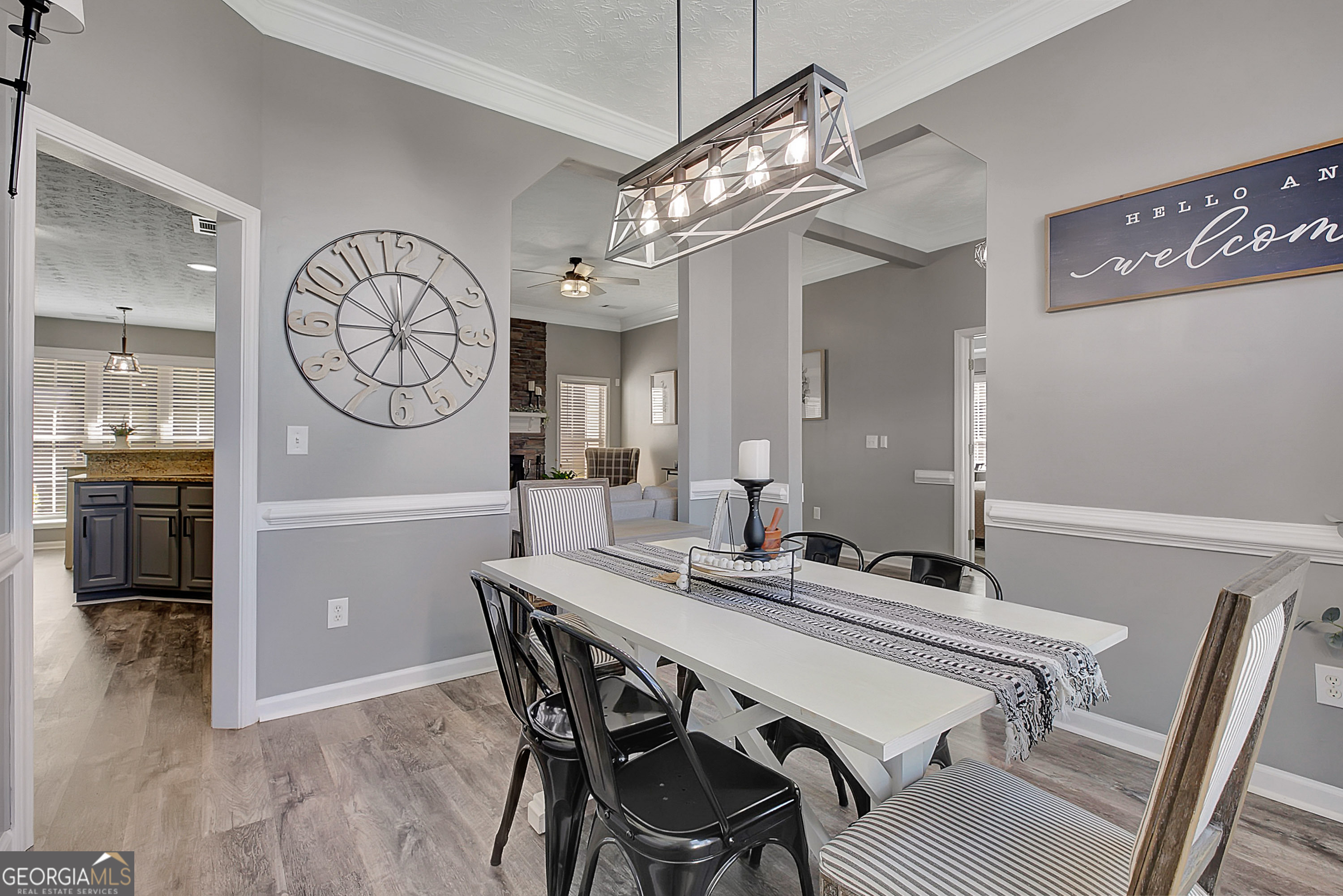 229 John Lovelace Road LaGrange, GA 30241 - Photo 10 of 59 a view of a dining room with furniture and a chandelier