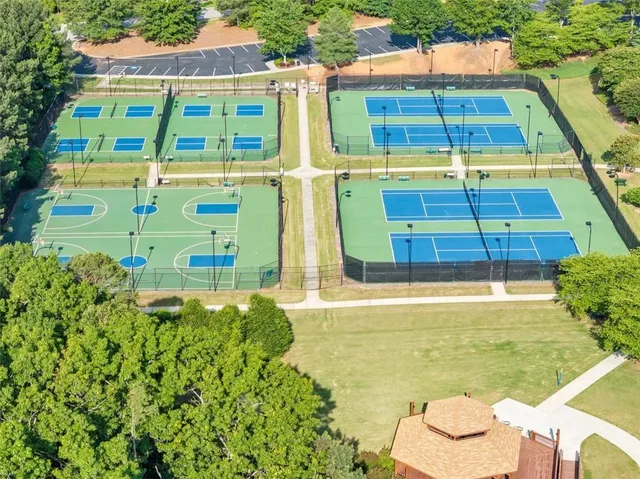 a aerial view of a house with a yard
