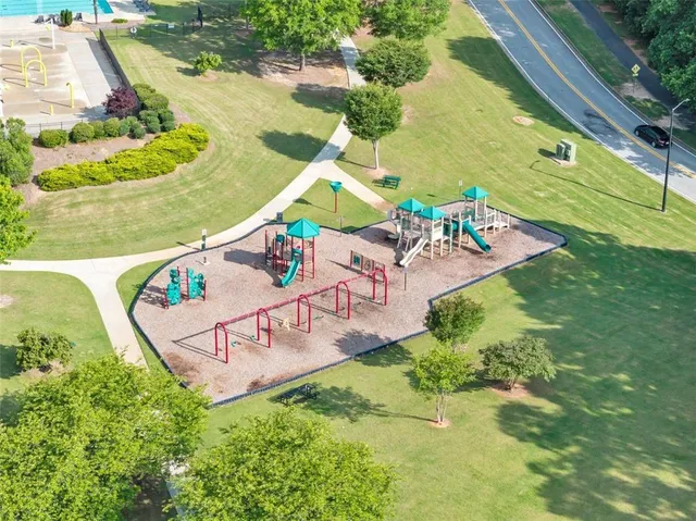 an aerial view of a house having swimming pool