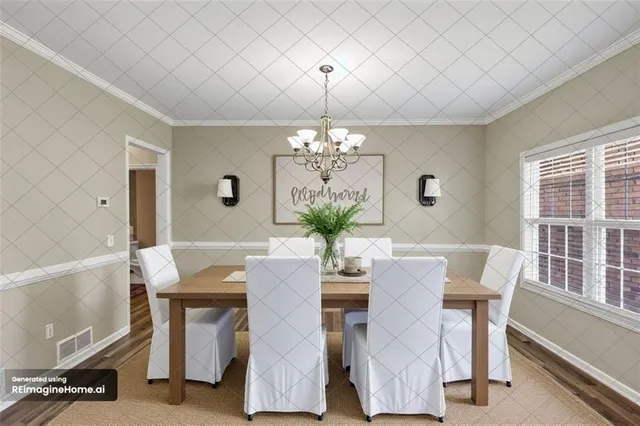 a view of a dining room with furniture and a chandelier
