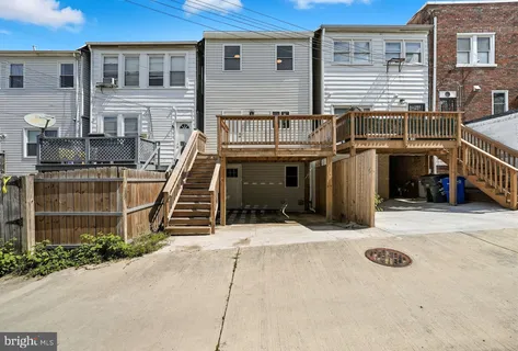 a front view of a house with a garage