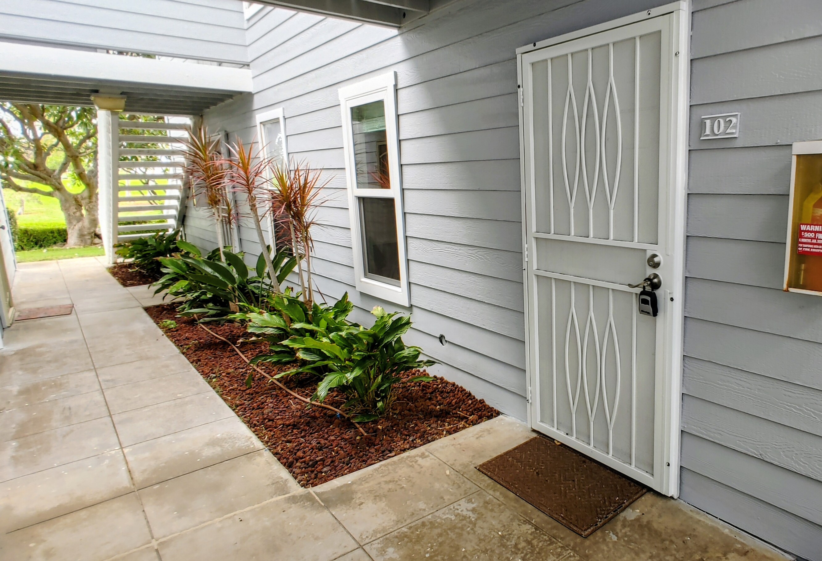 68-3831 Lua Kula Street, Unit E102 Waikoloa, HI 96738 - Photo 13 of 26 a view of a entryway door front of house