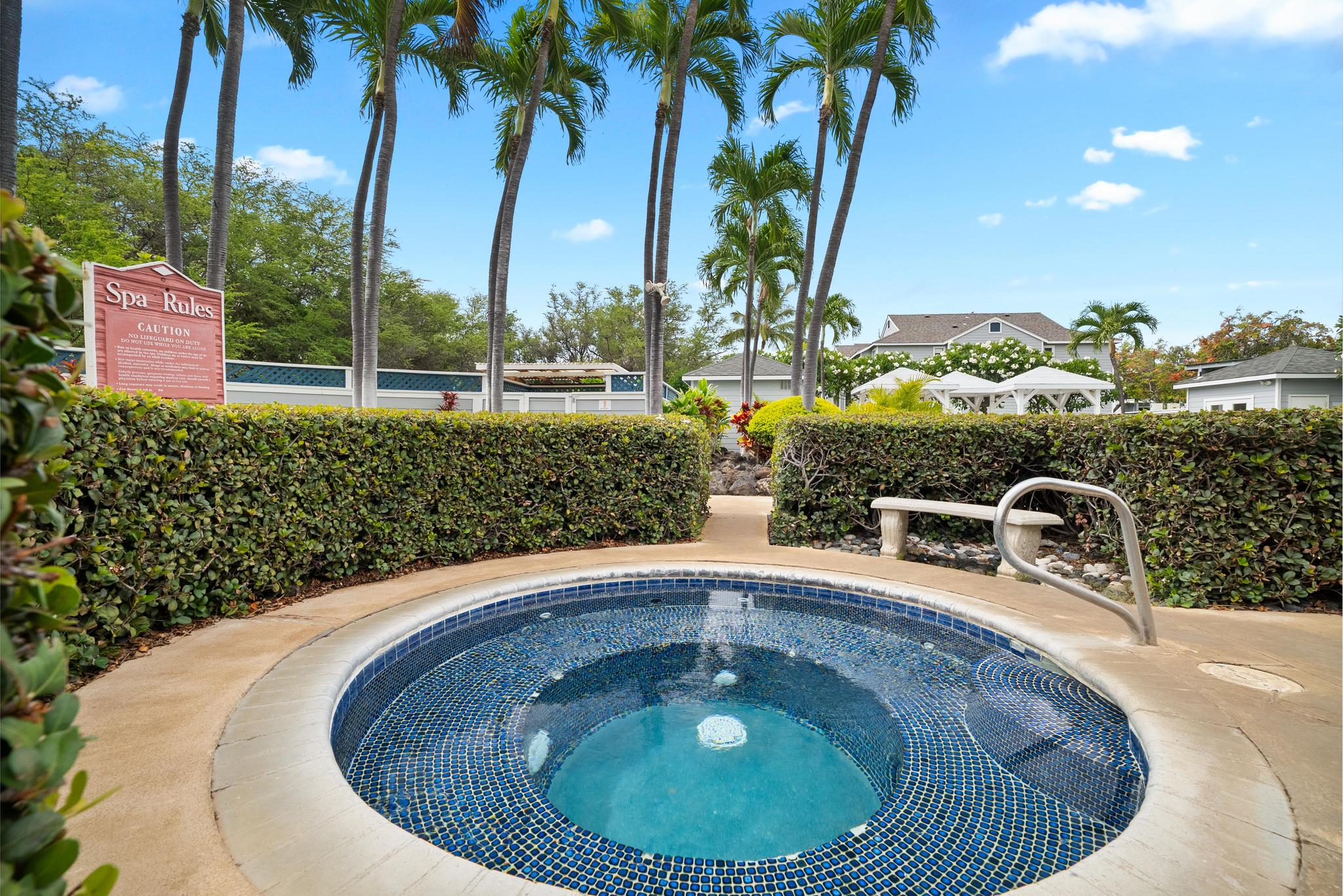 68-3831 Lua Kula Street, Unit E102 Waikoloa, HI 96738 - Photo 18 of 26 a swimming pool with outdoor seating and yard