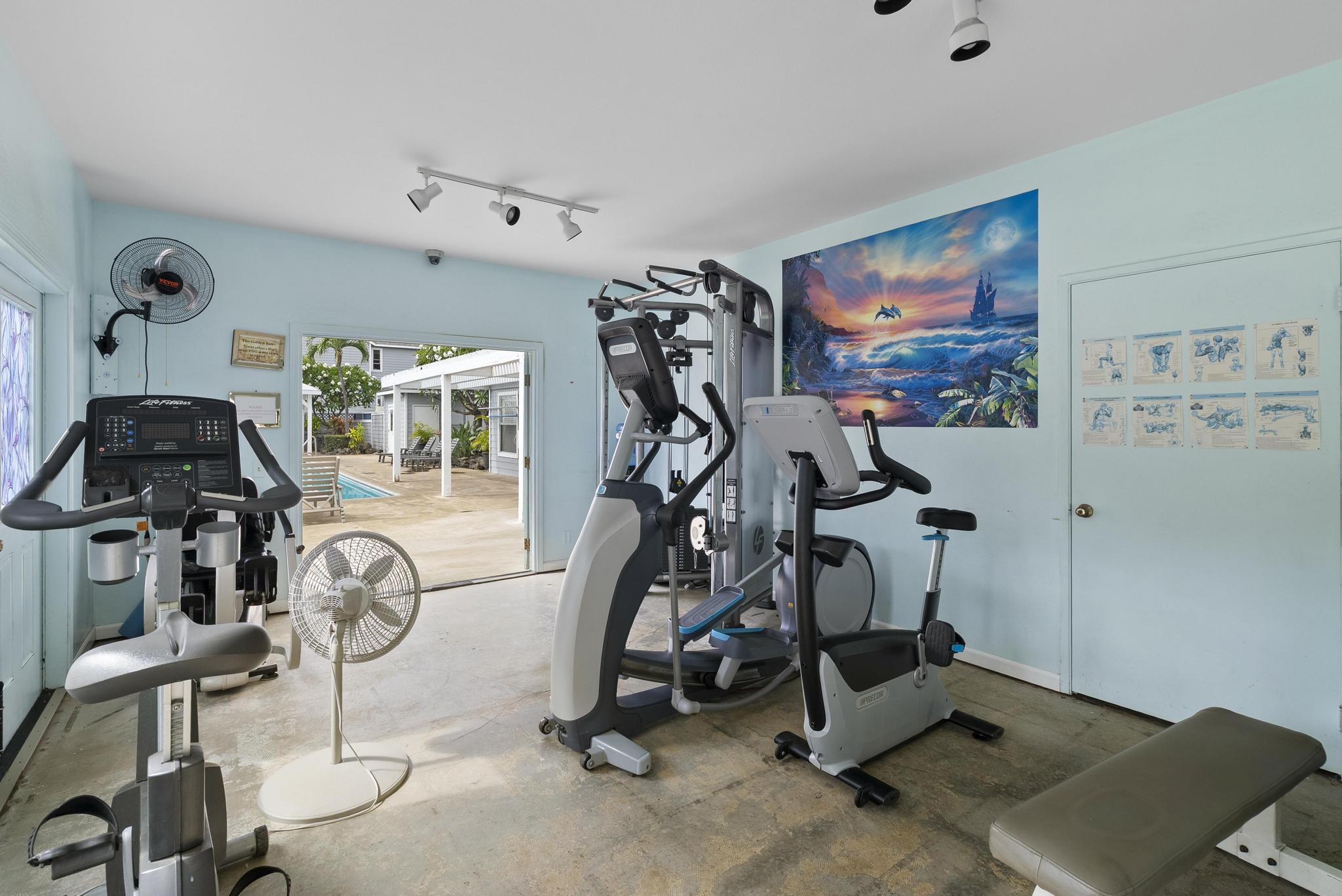 68-3831 Lua Kula Street, Unit E102 Waikoloa, HI 96738 - Photo 20 of 26 a view of a room with gym equipment