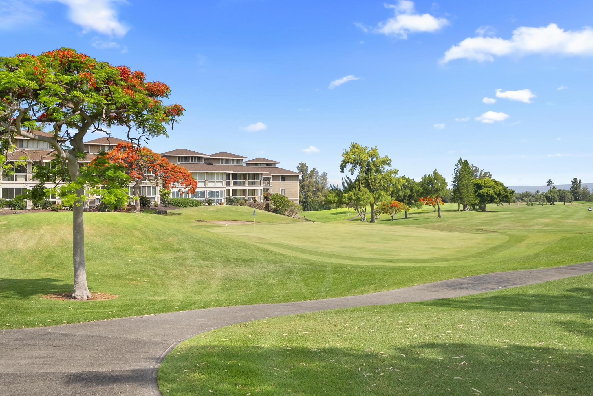 68-3831 Lua Kula Street, Unit E102 Waikoloa, HI 96738 - Photo 24 of 26 a view of building with garden