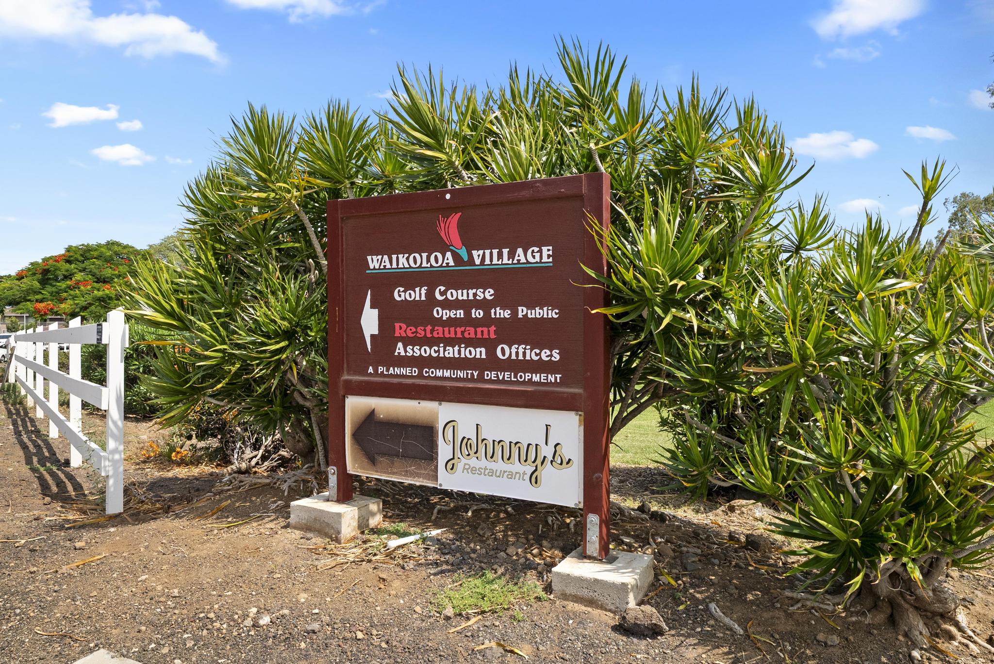 68-3831 Lua Kula Street, Unit E102 Waikoloa, HI 96738 - Photo 25 of 26 a sign that is sitting in front of a house