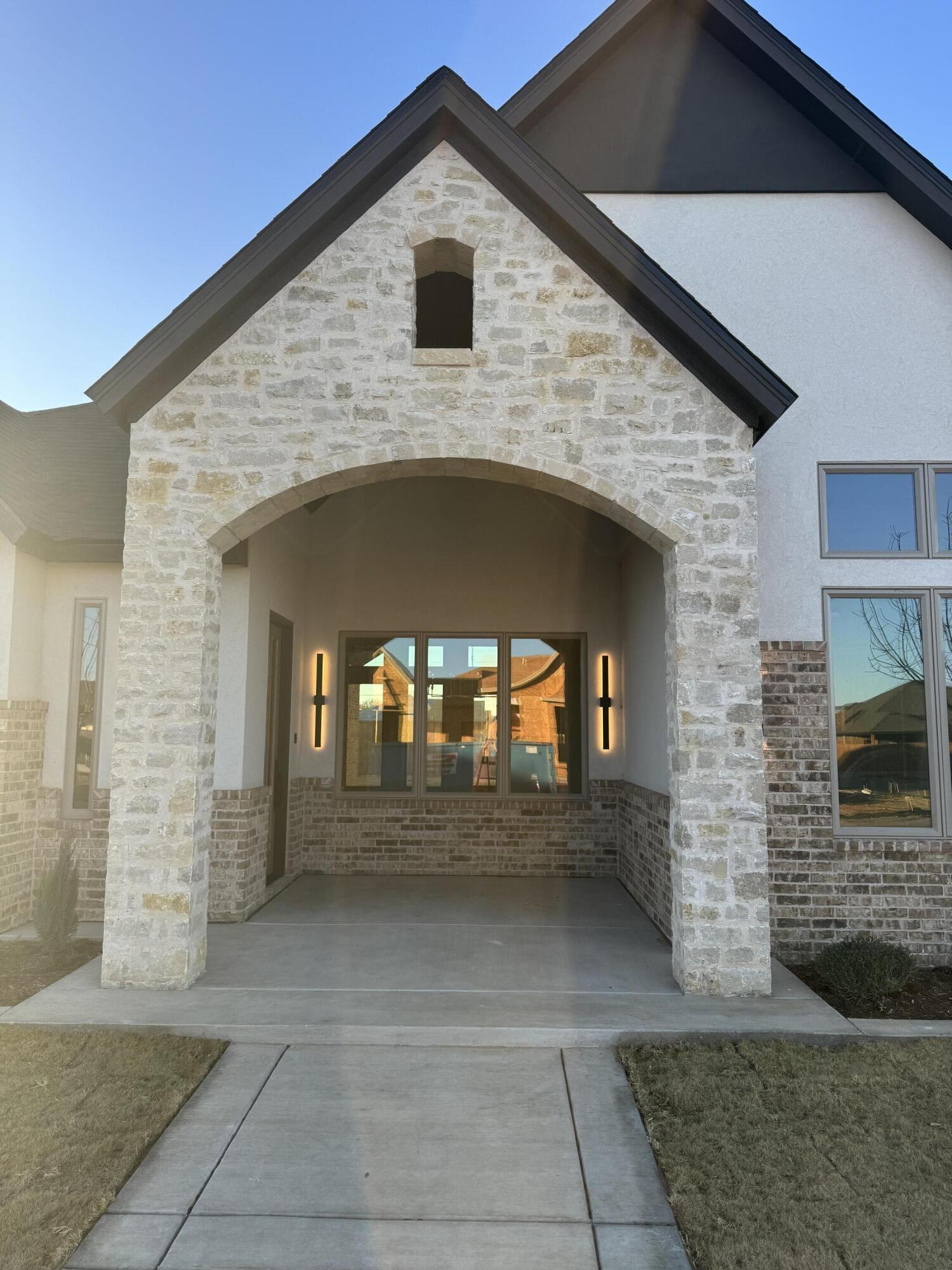 3613 143rd Street Lubbock, TX 79423 - Photo 5 of 44 a view of front door of house with stairs