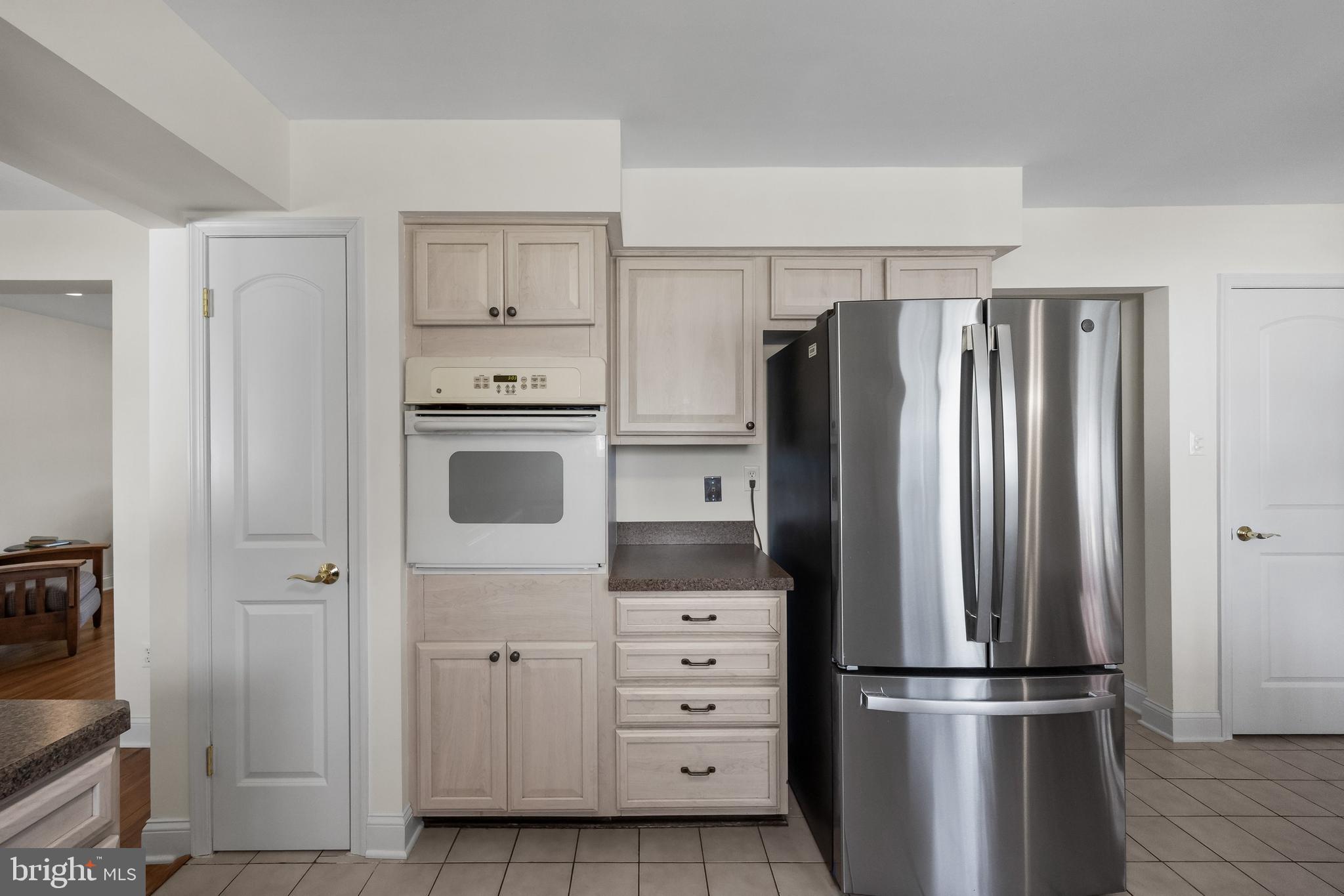 508 Perry Drive Mount Laurel, NJ 08054 - Photo 15 of 61 a kitchen with cabinets and stainless steel appliances