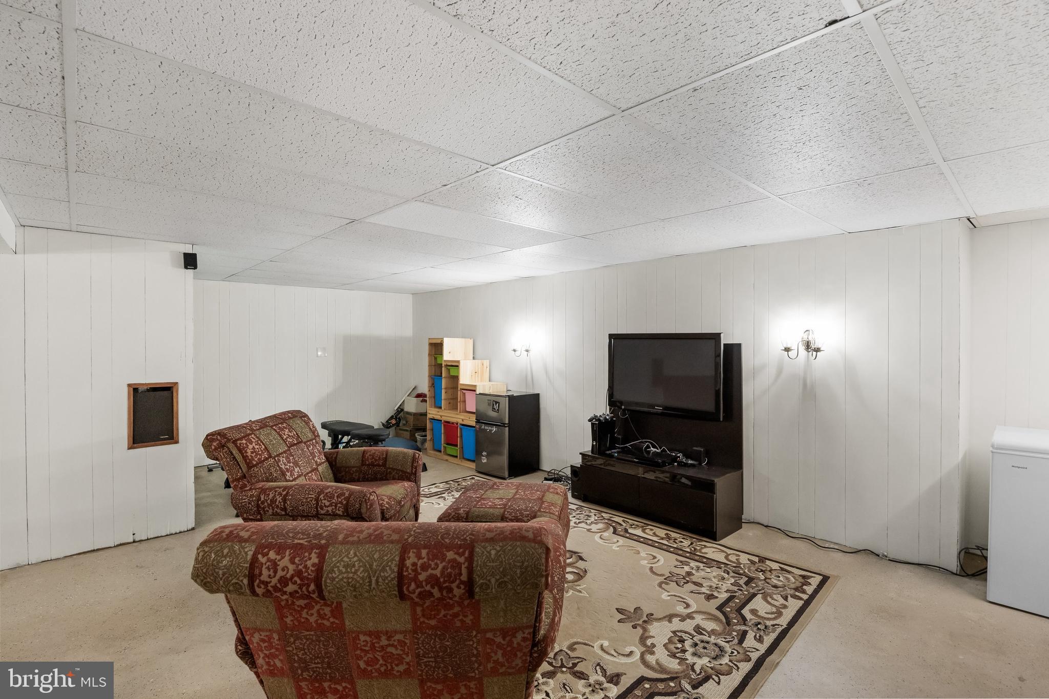 508 Perry Drive Mount Laurel, NJ 08054 - Photo 24 of 61 a living room with furniture and a flat screen tv