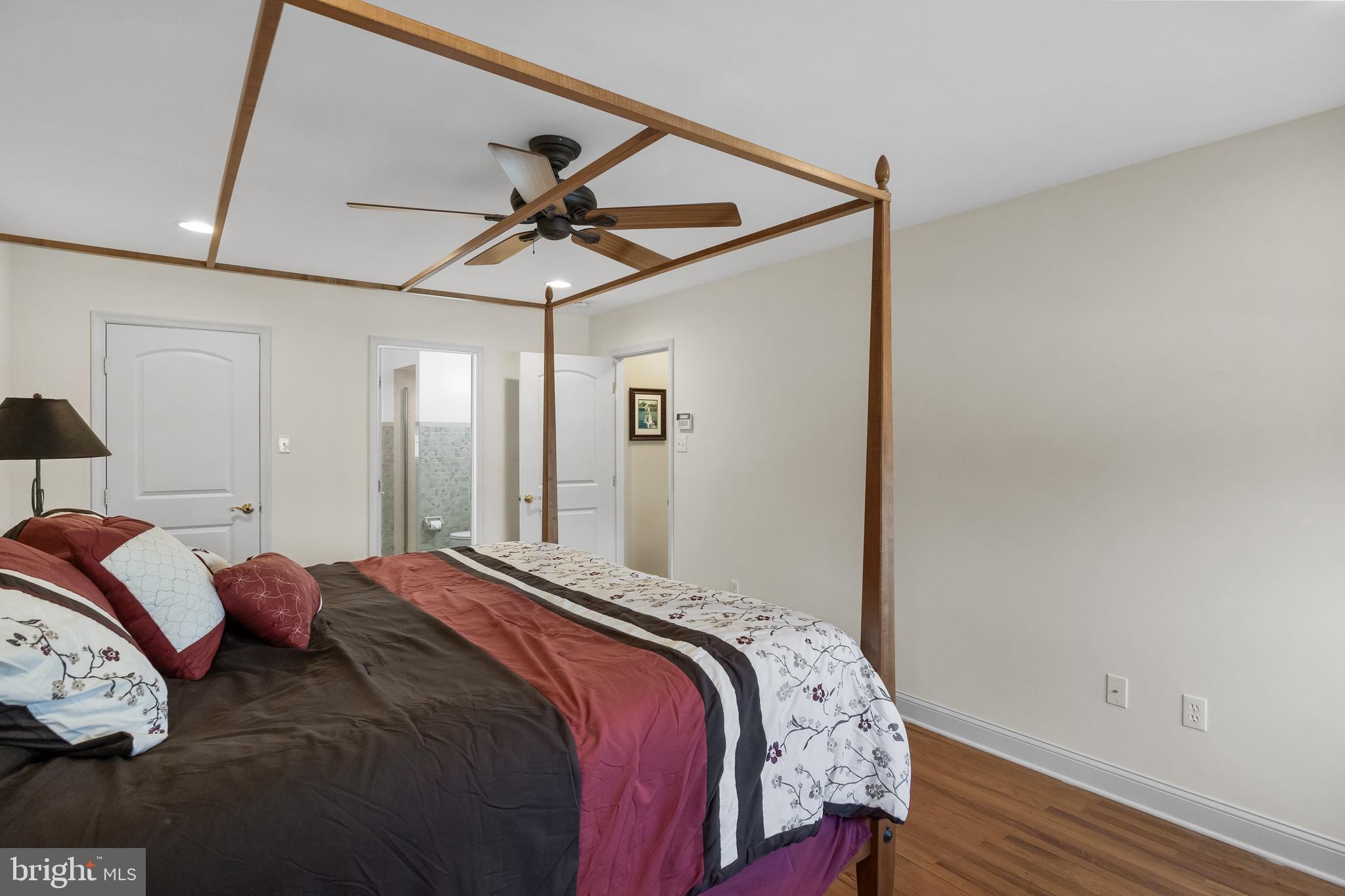 508 Perry Drive Mount Laurel, NJ 08054 - Photo 31 of 61 a bedroom with a bed and a chandelier