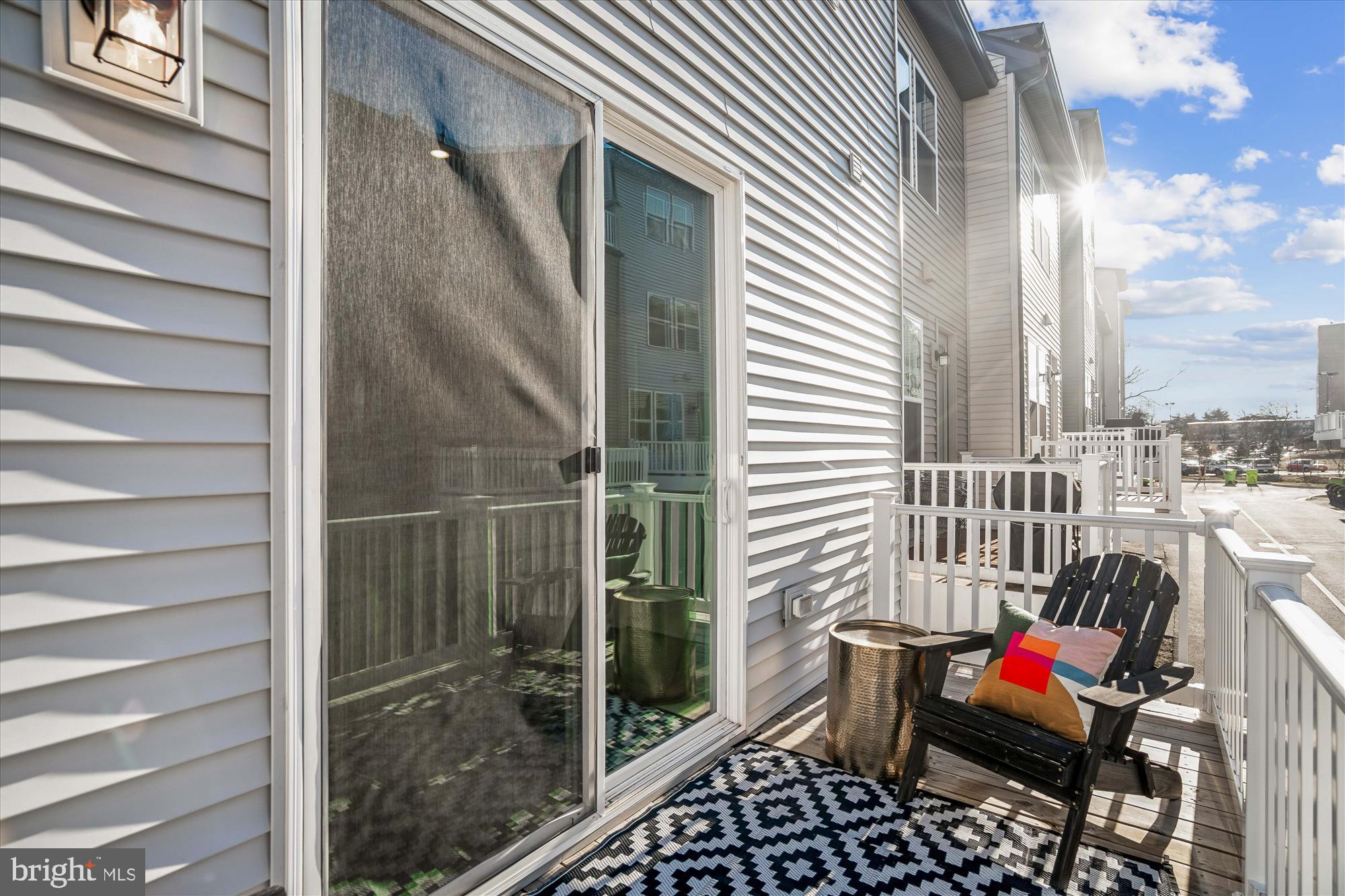 6732 Belcrest Road Hyattsville, MD 20782 - Photo 13 of 24 Sunny balcony with stylish outdoor decor.