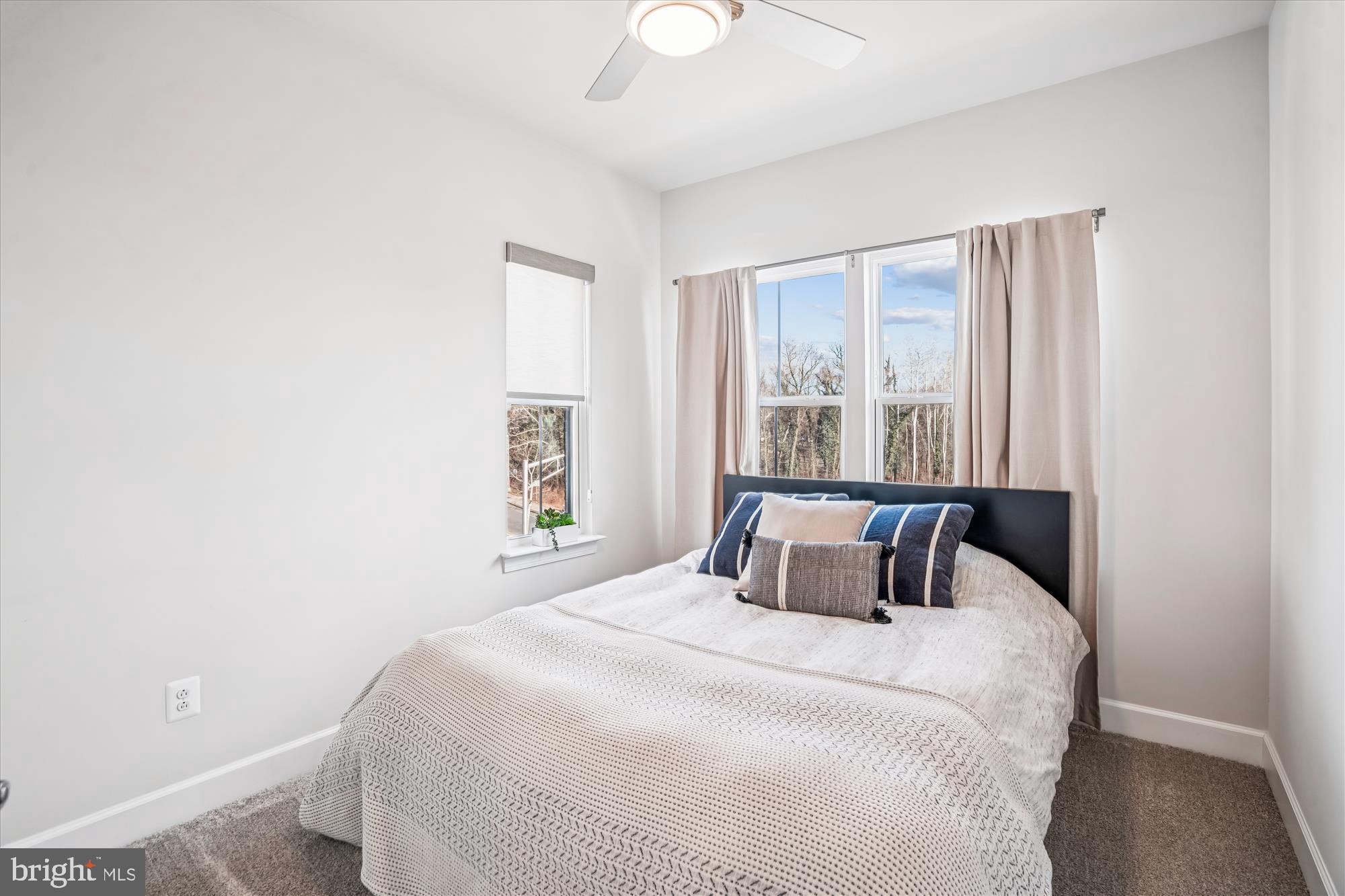 6732 Belcrest Road Hyattsville, MD 20782 - Photo 16 of 24 Bright and airy bedroom with serene views.