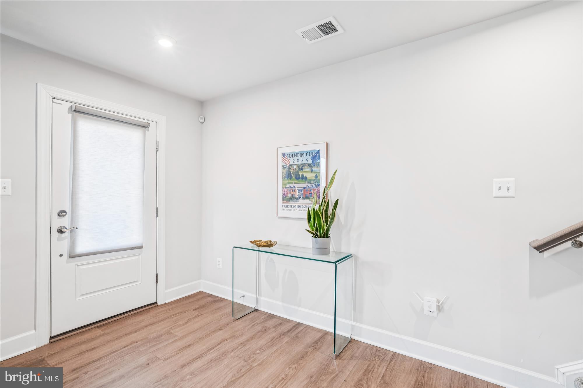 6732 Belcrest Road Hyattsville, MD 20782 - Photo 2 of 24 Welcoming entryway with modern charm.