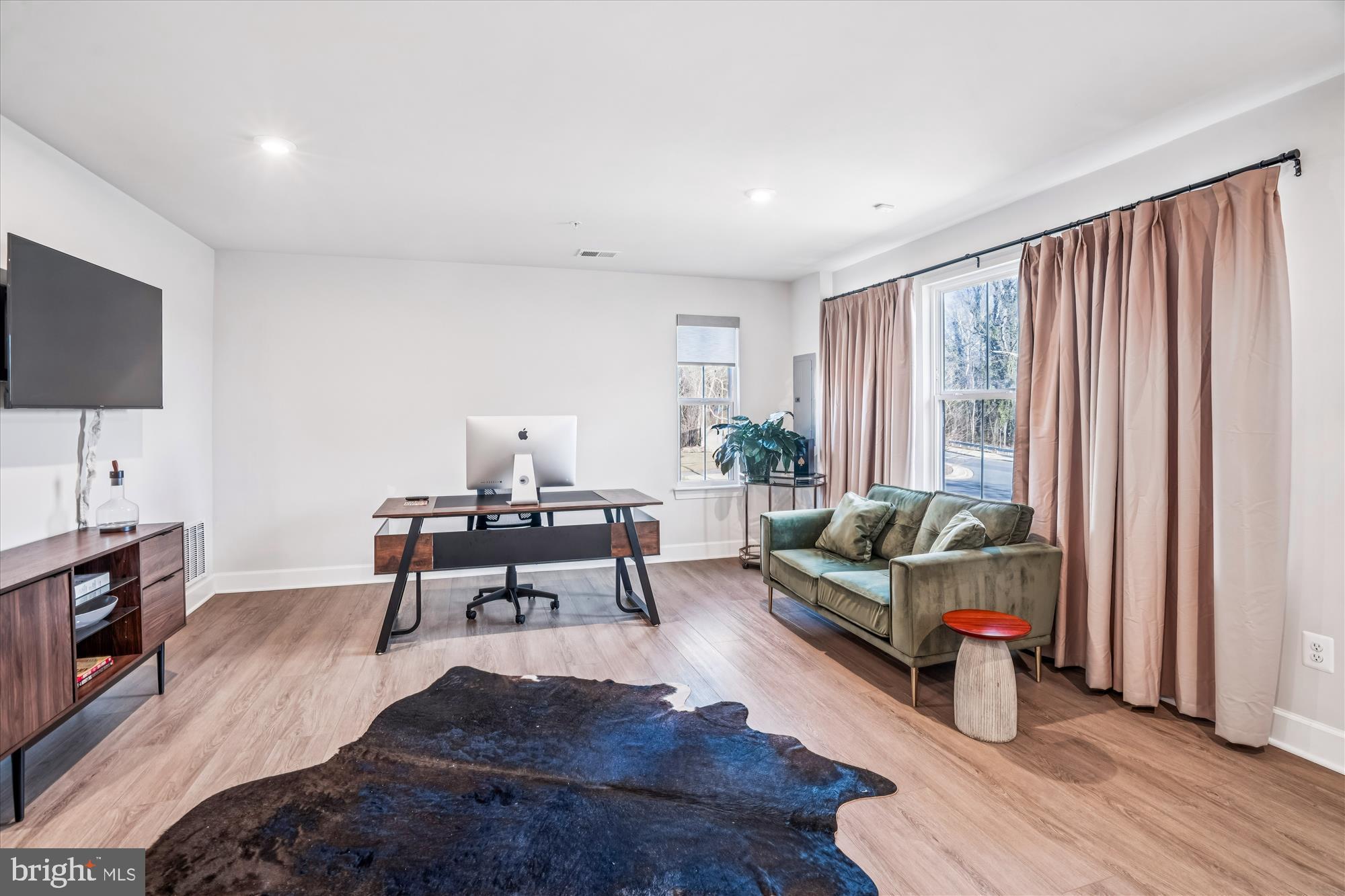 6732 Belcrest Road Hyattsville, MD 20782 - Photo 3 of 24 Modern workspace with natural light.