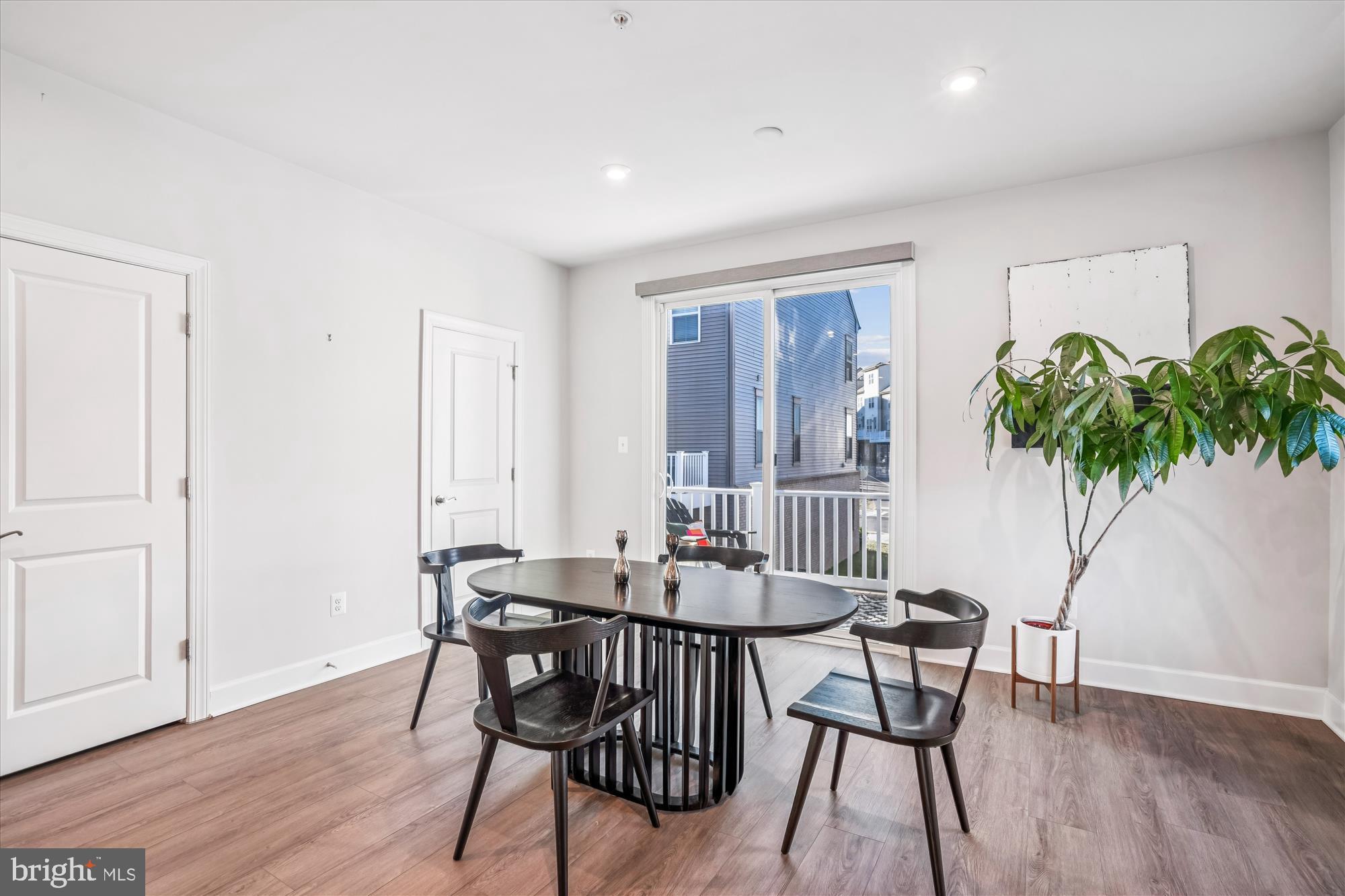 6732 Belcrest Road Hyattsville, MD 20782 - Photo 6 of 24 Bright and airy dining space with modern flair.