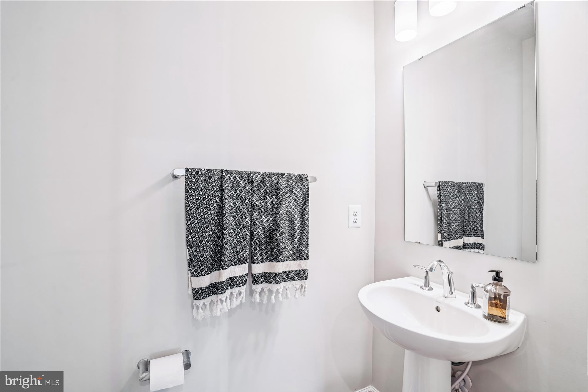 6732 Belcrest Road Hyattsville, MD 20782 - Photo 7 of 24 Sleek and modern bathroom oasis.