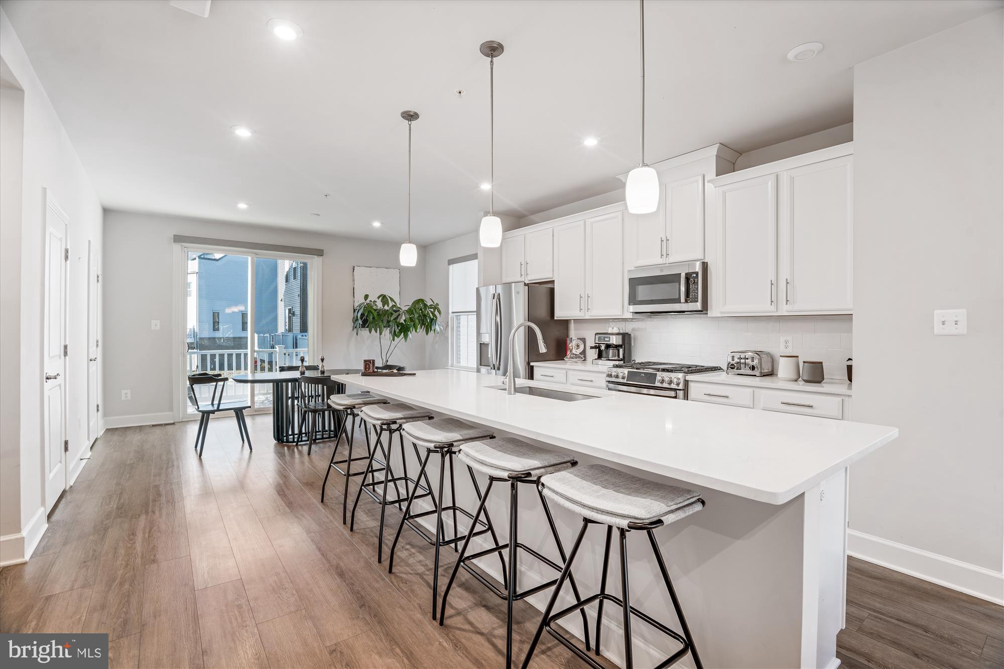 6732 Belcrest Road Hyattsville, MD 20782 - Photo 10 of 24 Modern kitchen with sleek design and light.