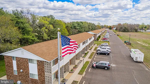 a view of a street with cars