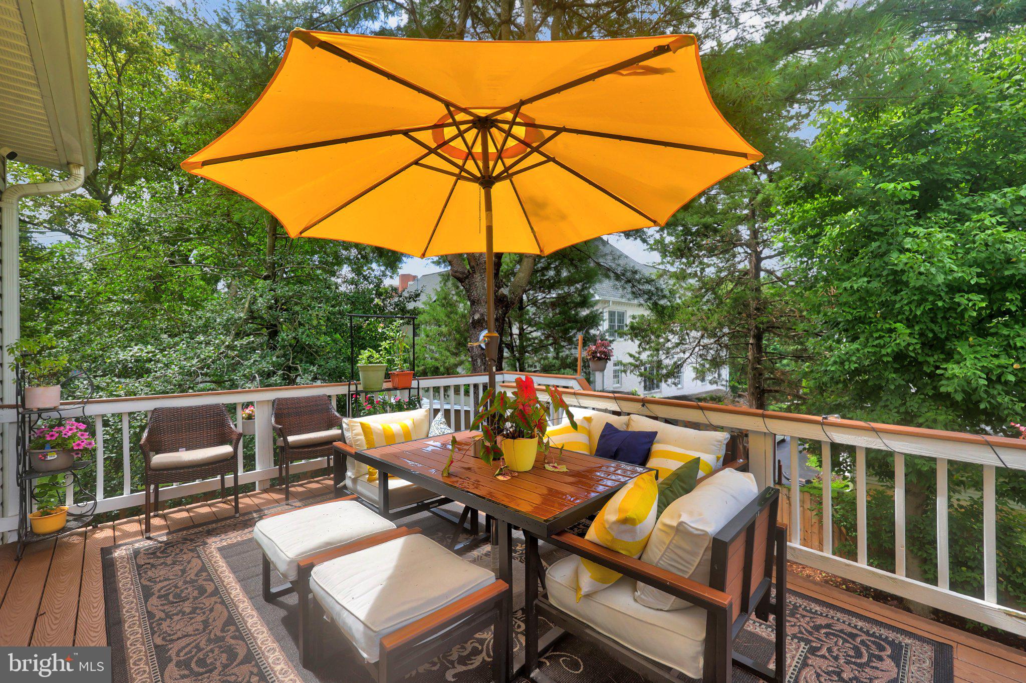 6732 Churchill Road McLean, VA 22101 - Photo 61 of 71 Sunny patio oasis with vibrant umbrella.