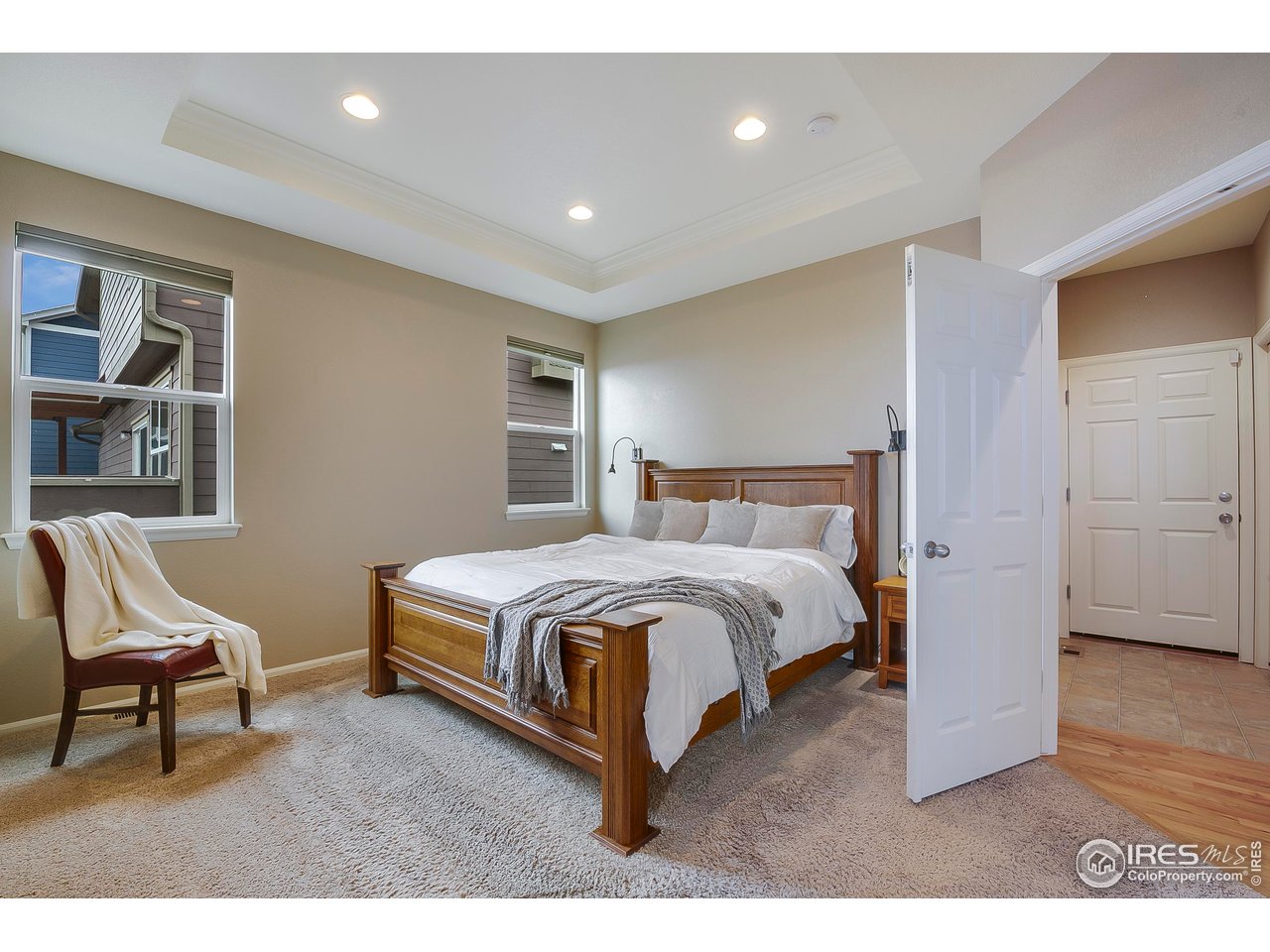 3374 Wagon Trail Road Fort Collins, CO 80524 - Photo 19 of 43 Primary suite w/ coffered ceilings and it's own reading nook