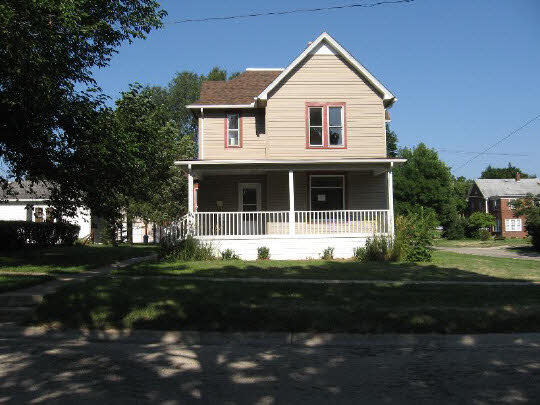 826 6th Street Rochelle, IL 61068 - Photo 1 of 10 a front view of a house with a yard